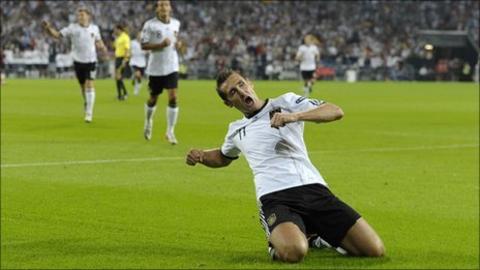 Miroslav Klose of Germany celebrates his team's first goal during