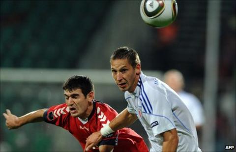 Armenia's Valeri Aleksanjan and Slovakia's Filip Holosko