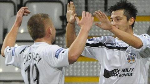 David Cushley congratulates goalscorer Jordan Hughes at Seaview