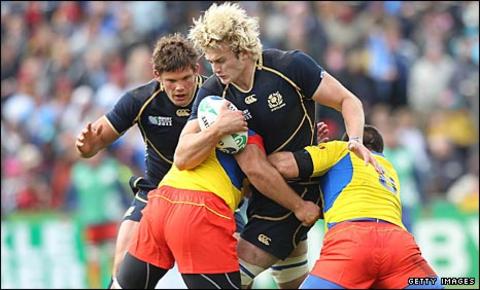 Richie Gray is held up Romania