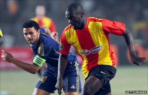Esperance's Joseph Yannick N'Djeng (right) battles with Al Ahly's Hossam Ghaly