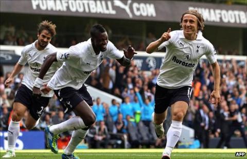 Luka Modric (right) celebrates his goal against Liverpool