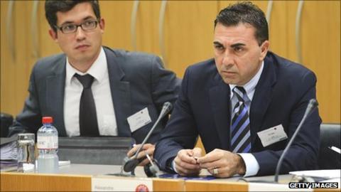 Sion's General-Director Domenicangelo Massimo (r) sits next to the club's lawyer at their Uefa appeal hearing