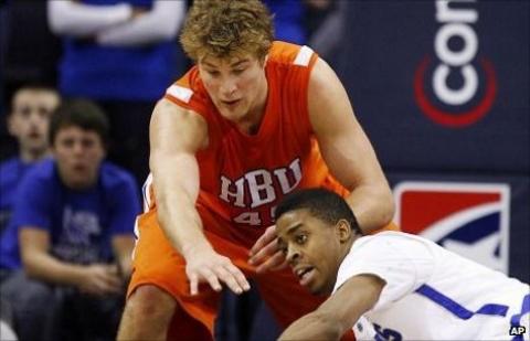 Mario Flaherty and opponent battle for the ball
