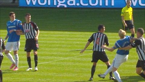 Steven Naismith strikes Dunfermline's Austin McCann