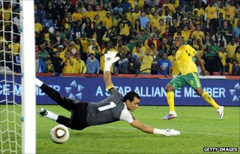 South Africa's Katlego Mphela scores against Egypt in a Nations Cup qualifier in 2011
