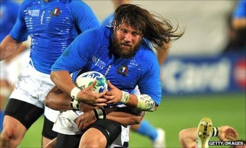 Italy's Martin Castrogiovanni carries the ball against the United States