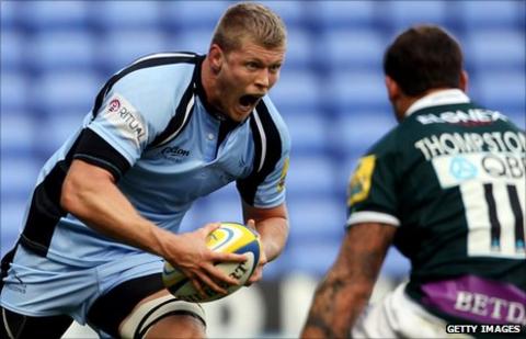 James Hudson (left) takes on a London Irish player