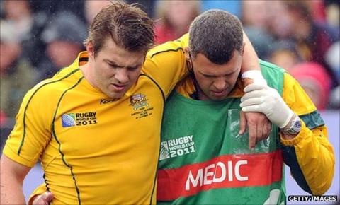 Drew Mitchell leaves the field injured against Russia