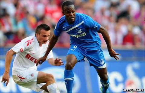 Slawomir Peszko of Cologne and Knowledge Musona (right)