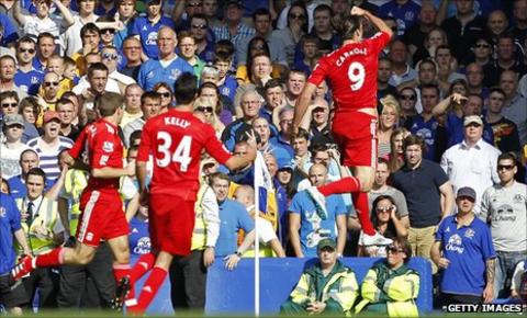 Andy Carroll celebrates his goal against Everton