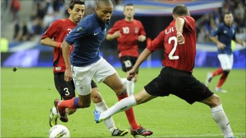 French forward Loic Remy (C) vies with Albania's defenders Kristi Vangjeli (L) and Andi Lila in les bleus' Euro 2012 clash