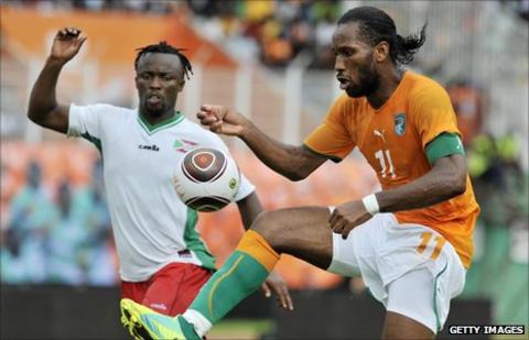 Didier Drogba challenges for the ball against Burundi