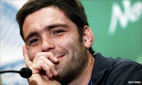 Dimitri Yachvili smiles as he speaks to the media on Wednesday