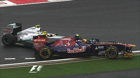 Nico Rosberg collides with Jaime Alguersuari