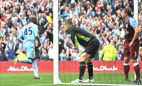 Mario Balotelli puts Manchester City ahead against Aston villa