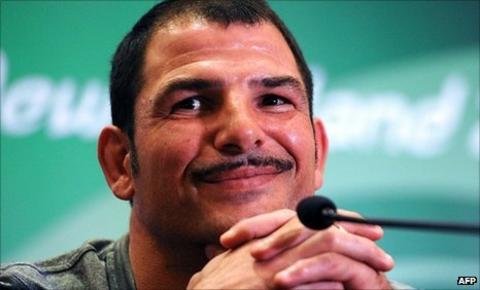 Marc Lievremont smiles as he addresses the media on Sunday after France's semi-final win over Wales
