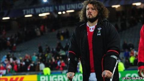 Adam Jones on crutches