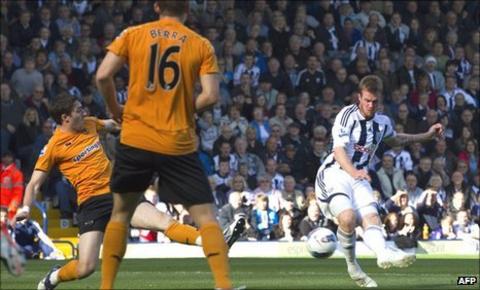 Chris Brunt (right) scores for West Brom against Wolves