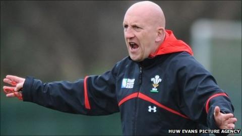 Wales defence coach Shaun Edwards makes a point during training