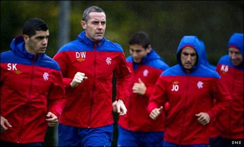 David Weir (second left) in training