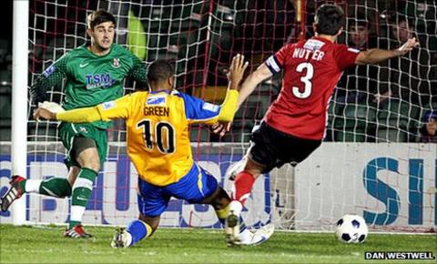 Matthew Green scores Mansfield's equaliser against Lincoln