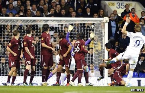 Roman Pavlyuchenko fires into the net
