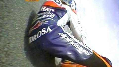 Dani Pedrosa comes off his Honda