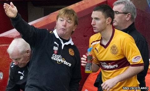 Stuart McCall passes on instructions to substitute Bob McHugh