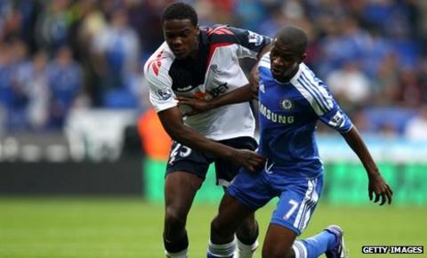 Bolton's Dedryck Boyata (left) challenges Chelsea's Ramires