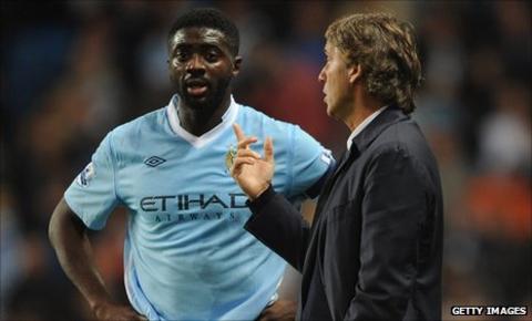Kolo Toure and Man City boss Roberto Mancini