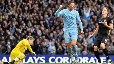 Wayne Hennessey and Edin Dzeko