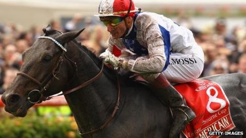 Americain being ridden to victory by Gerald Mosse at the 2010 Melbourne Cup