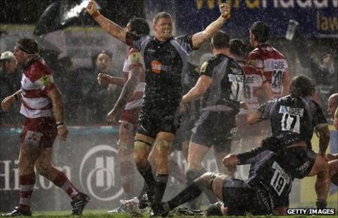 James Hudson (arms aloft) celebrates Newcastle Falcons' win against Gloucester last season