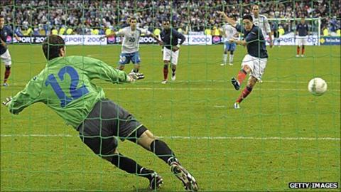 France's Samir Nasri scores a penalty past Asmir Begovic in Bosnia's final group match