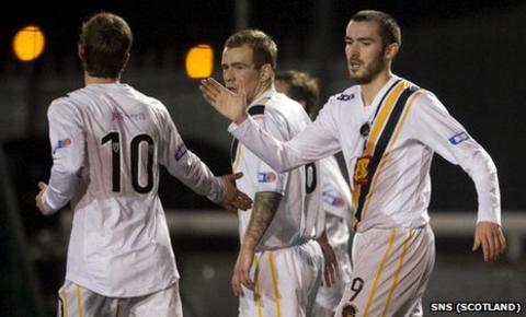 Darren Gribben celebrates with his team-mates after scoring for Berwick Rangers
