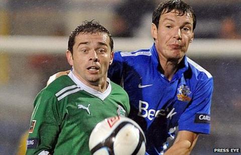 Chris Scannell of Cliftonville in action against Glenavon's Kyle Neill