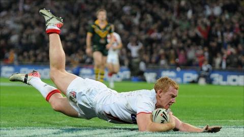Jack Reed of England scores a try