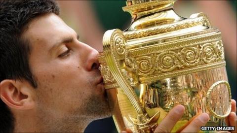 Novak Djokovic with the Wimbledon trophy
