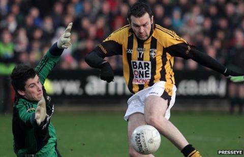 Oisin McConville is about to score past Burren keeper Cathal Murdock