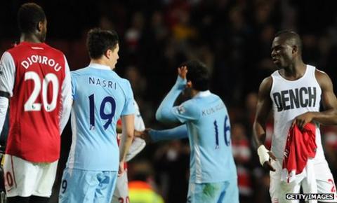 Samir Nasri (centre) and Emmanuel Frimpong (right)