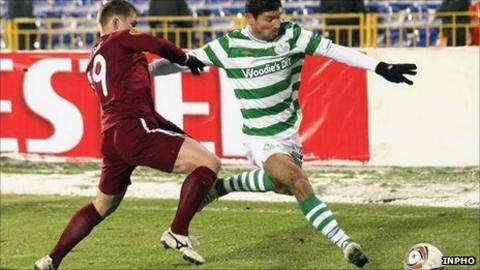 Rubin's Vitali Kaleshin attempts tp prevent Enda Stevens delivering a cross