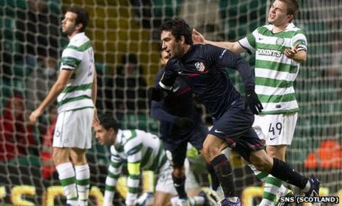 Atletico Madrid star Arda Turan wheels away to celebrate his goal