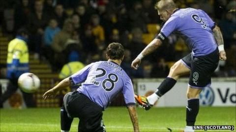 Hibs striker Garry O'Connor gives the visitors the lead at Fir Park