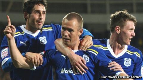 Kenny Miller (centre) celebrates with Peter Whittingham and Joe Mason