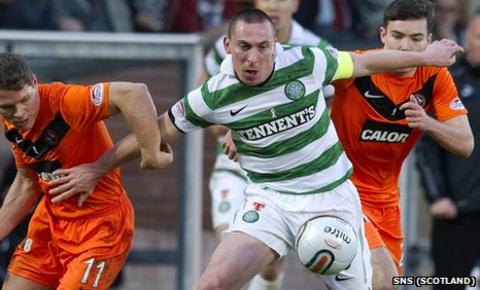 Celtic midfielder Scott Brown in action at Tannadice