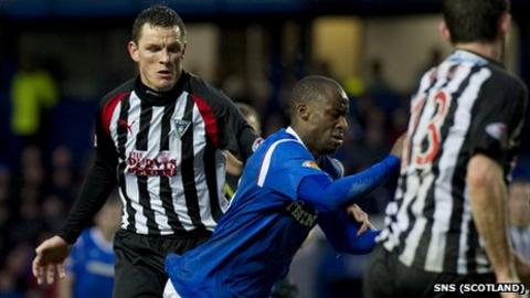 Sone Aluko (centre) was awarded a penalty in the 2-1 win over Dunfermline