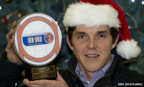 Ian Little with his award