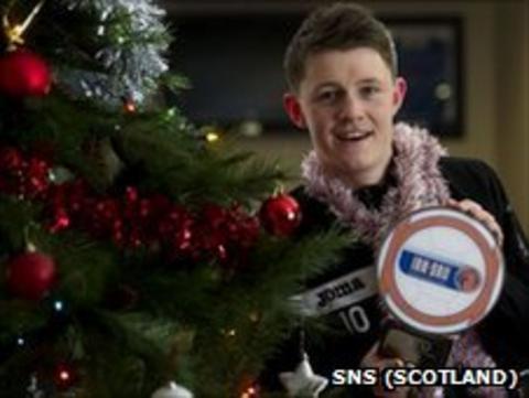 Ryan Donnelly with his award
