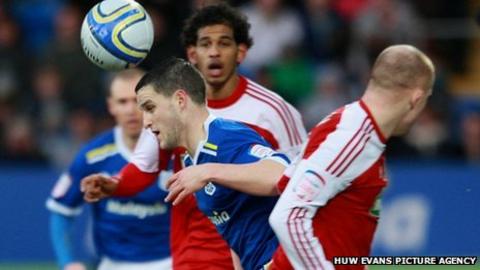 Cardiff's Craig Conway bursts through the Middlesbrough midfield